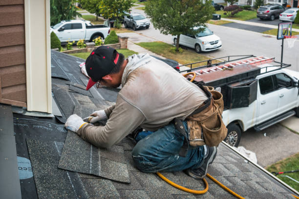 Professional Roofing technician working in North Stonington, CT
